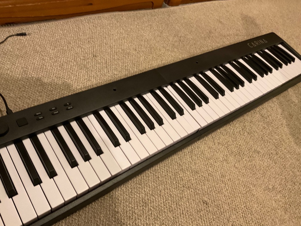 電子ピアノ 88鍵盤 折りたたみ 鍵盤光る スリムボディ 充電可能