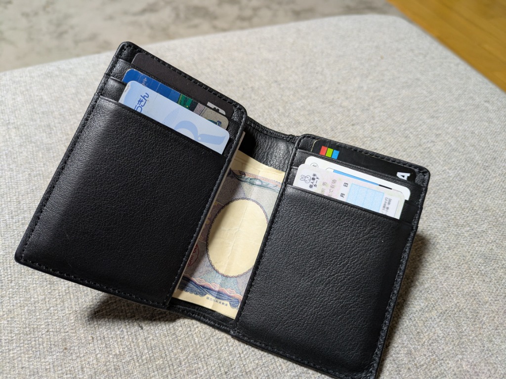 LACOSTE 財布 シュリンクカウレザー ジップコインポケット付き